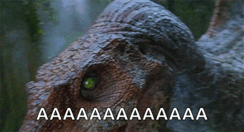 a close up of a dinosaur with the words aa aa aa aa aa aa on it