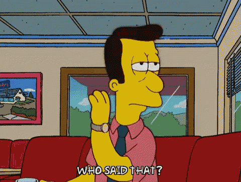 a cartoon character from the simpsons is sitting on a couch and saying " who said that "