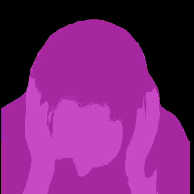 a person wearing headphones with their eyes closed
