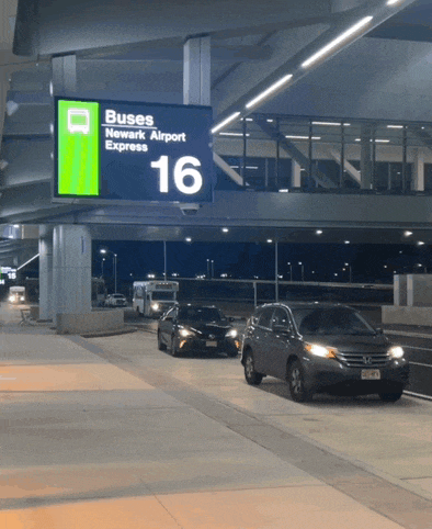 a sign that says buses newark airport express 16 on it