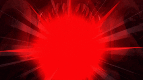 a red light is shining in the dark with a white light coming out of it