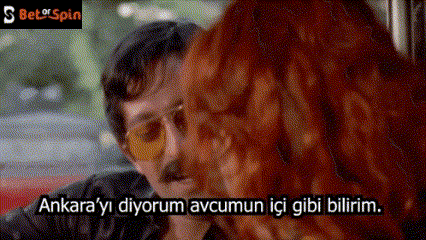 a man with a mustache is talking to a woman with red hair and the words ankara yi diyorum avcumun ici gibi bilirim