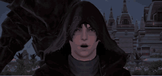 a man wearing a black hood has a red glowing mask on his face