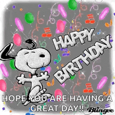 snoopy is dancing on a birthday card with balloons .