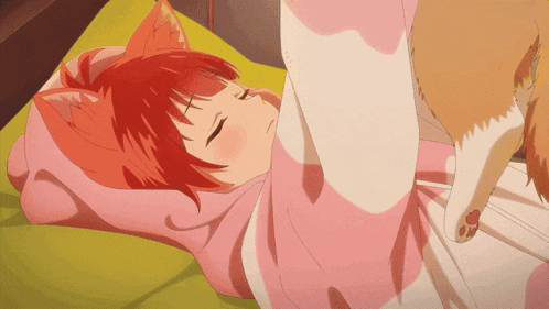 a girl with red hair and cat ears is sleeping with a cat