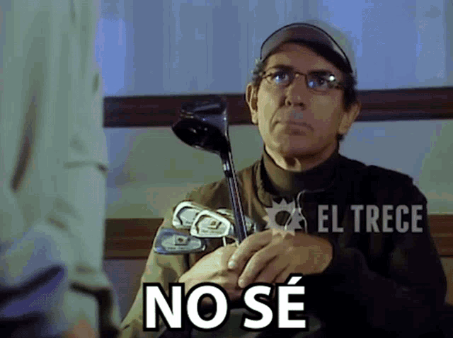 a man holding a golf club with the words no se written below him