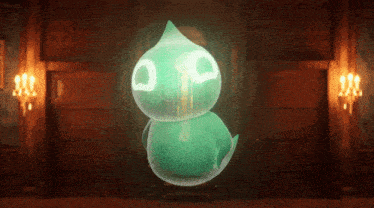 a green cartoon character with a tear coming out of it 's eye