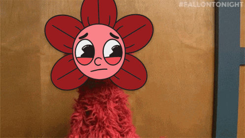 a cartoon flower with a sad face and the hashtag #fallontonight on the bottom