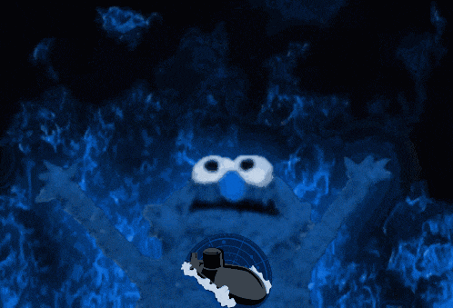 a drawing of sesame street cookie monster surrounded by fire