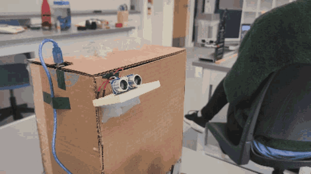a cardboard box with a sticker on it that says ' ultrasonic sensor '