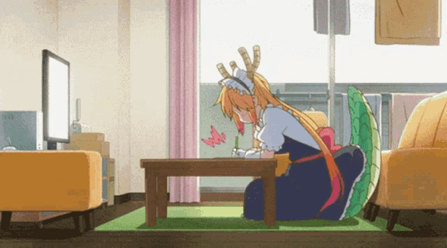 a girl with horns sits at a table with a butterfly on it