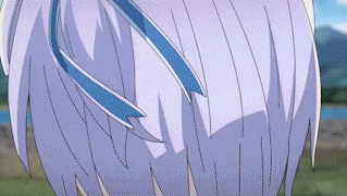 a close up of a person 's hair with a blue ribbon around it