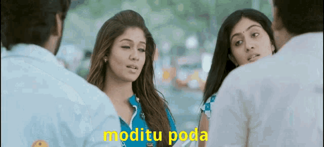 a group of people are standing next to each other with the words moditu poda written in yellow