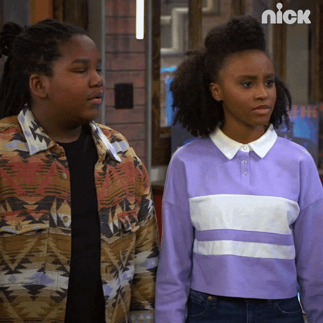 a boy and a girl are standing next to each other with the nick logo in the corner