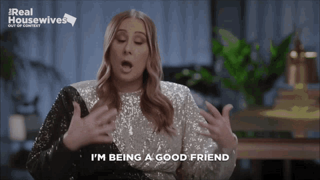 a woman says i 'm being a good friend while wearing a sequined top