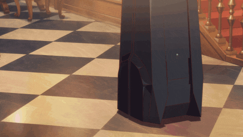 a person standing on a checkered floor next to a staircase