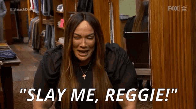 a woman says " slay me reggie " while sitting in a closet