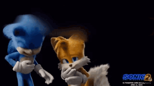 sonic the hedgehog and tails from the movie sonic 2 are standing next to each other