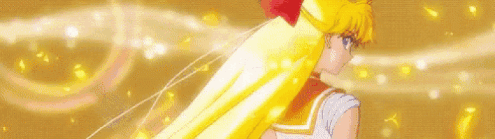 a close up of a person with a yellow hair and a red bow .