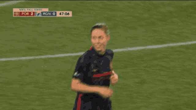 a female soccer player is running on the field during a match