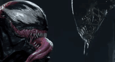 a close up of venom 's mouth with its tongue out