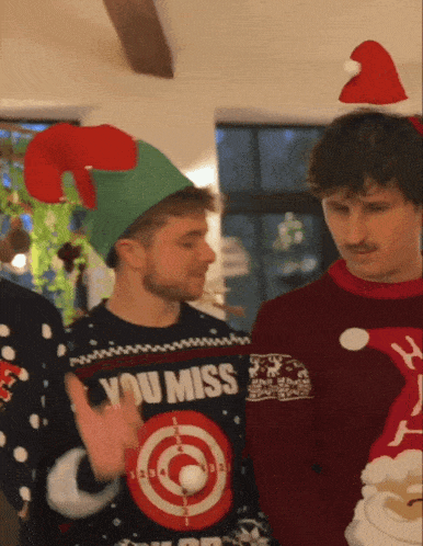 a man wearing a sweater that says " you miss "