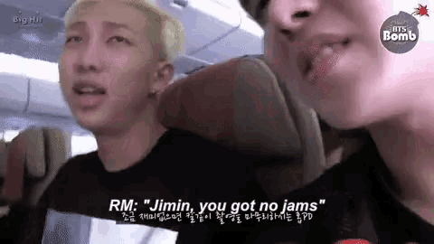 two men are sitting next to each other on an airplane and one of them says rm jimin you got no jams