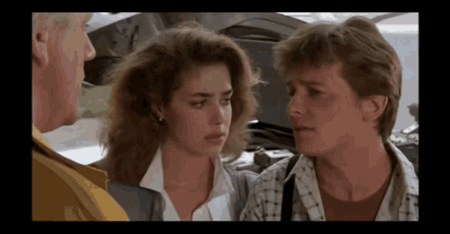 a man and a woman are talking to each other