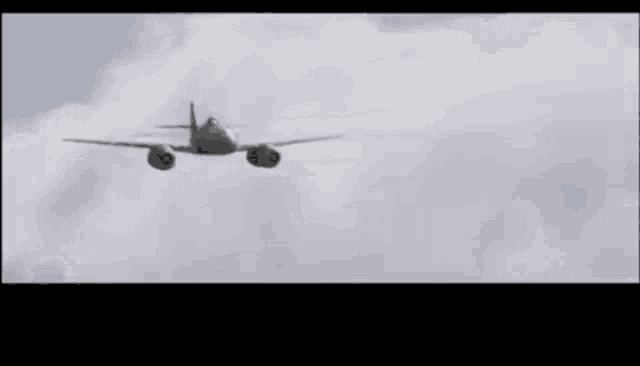 a plane is flying through a cloudy sky in a cartoon .