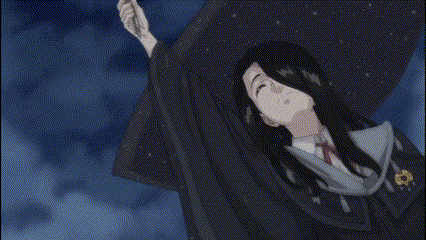 a person in a black robe is standing in the dark holding a sword .