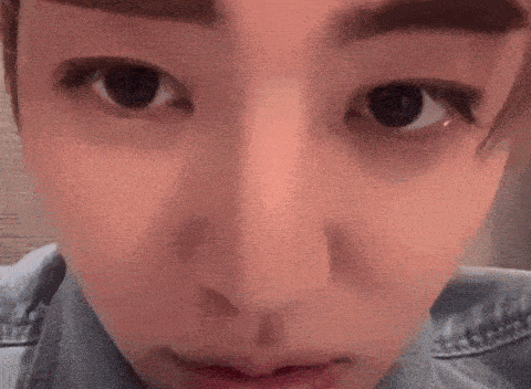 a close up of a person 's eyes and mouth