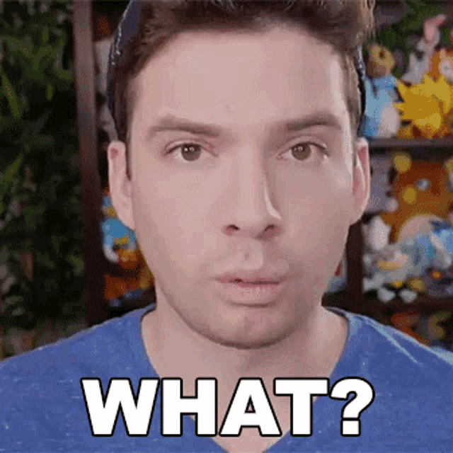 a man in a blue shirt is making a face and saying what ?