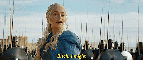 a woman is standing in front of a crowd of soldiers and says bitch , i might