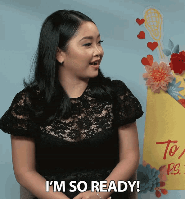 a woman says i 'm so ready in front of a sign that says to ps