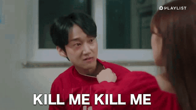 a man in a red sweater is being punched by a woman who says kill me kill me