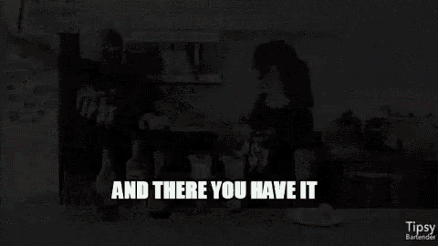 a man and a woman are dancing in a kitchen with the words and there you have it written on the bottom .