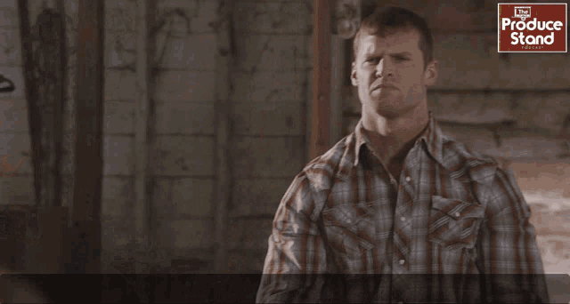 a man in a plaid shirt says laundry day then