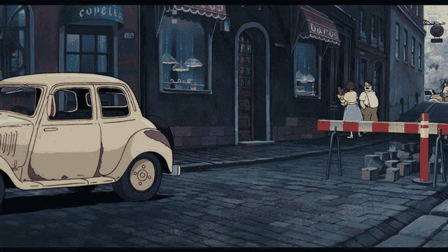 a car is parked in front of a store that says copelles