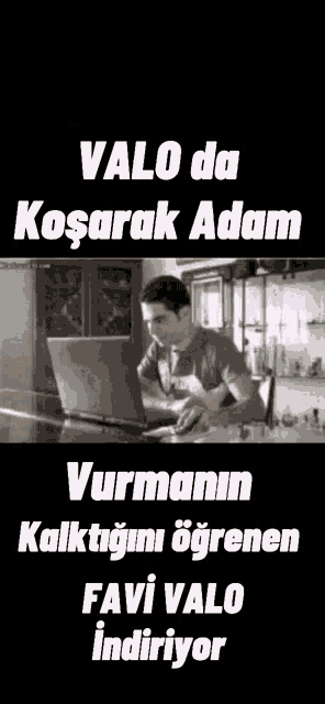 a man is sitting at a table using a laptop computer with the words valo da kosarak adam written on the bottom