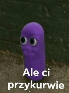 a purple worm with big eyes is standing in front of a brick wall and says `` ale ci przykurwie '' .