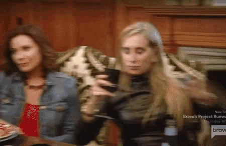 two women sitting at a table with a bravo 's project logo on the bottom right