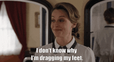 a woman in a white shirt says i don 't know why i 'm dragging my feet