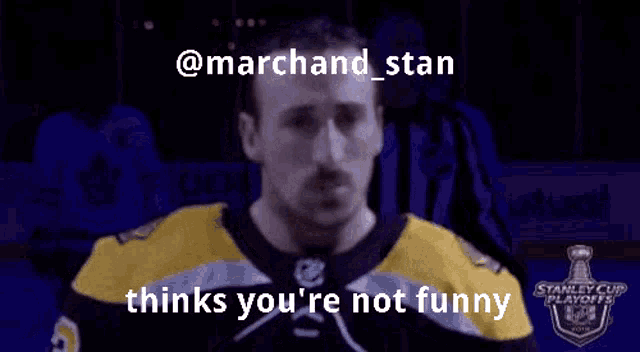 a man in a hockey jersey says that he 's not funny in front of a referee .