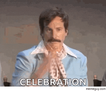 a man with a mustache is sitting at a table with the word celebration written on it