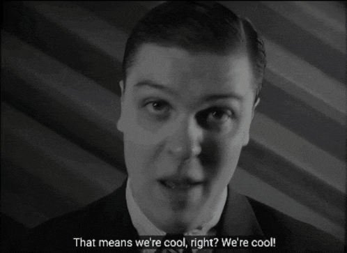 a man says please think we 're cool in a black and white photo