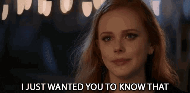 a woman with red hair is saying i just wanted you to know that