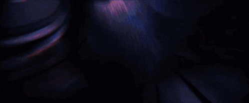 a blue background with a light coming out of the middle