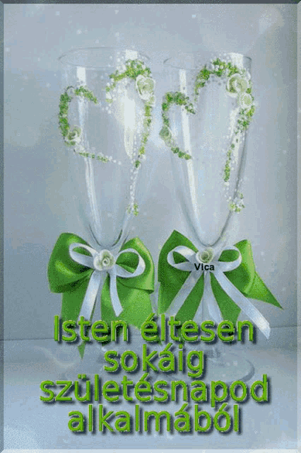a greeting card with two glasses and the words isten eltesen