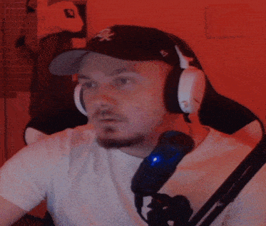 a man wearing headphones and a hat that says ny