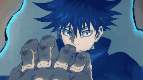 a close up of a person 's hand with a blue haired character behind it